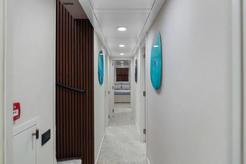 Panacea Yacht Photos Pics Luxurious hallway interior of 2011 Mengi Yay 115 MY yacht, featuring modern design elements.