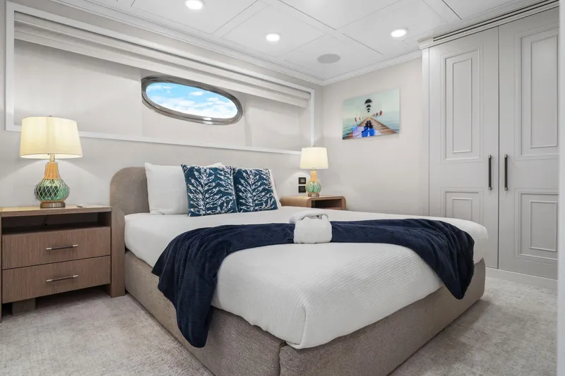 Panacea Yacht Photos Pics Luxurious bedroom interior on 2011 Mengi Yay 115 MY yacht with elegant decor.