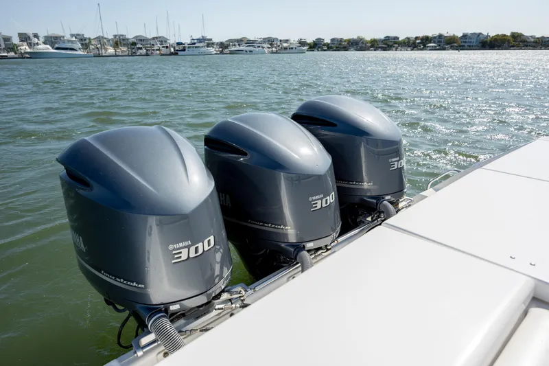  Yacht Photos Pics Triple Yamaha 300 engines on a 2017 Everglades 355 Tournament boat in open water.