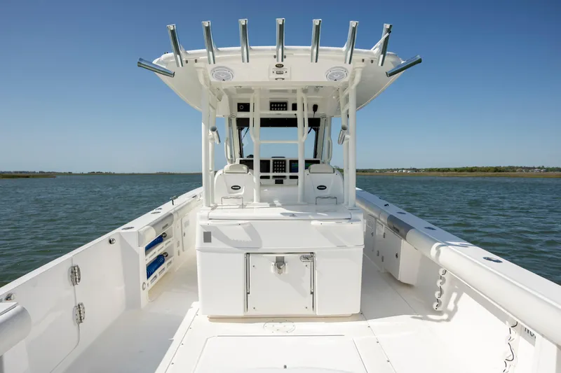  Yacht Photos Pics 2017 Everglades 355 Tournament boat on water, featuring spacious deck and modern design.