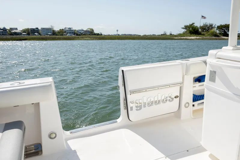  Yacht Photos Pics 2017 Everglades 355 Tournament boat on calm water, open side door view.