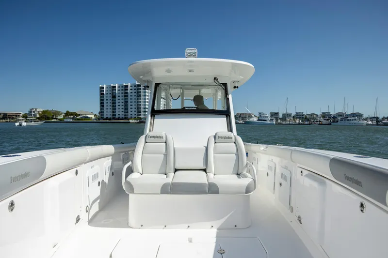  Yacht Photos Pics 2017 Everglades 355 Tournament boat on water, with modern seating and coastal backdrop.