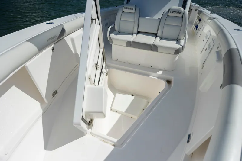 Yacht Photos Pics 2017 Everglades 355 Tournament boat interior with seating and storage compartments.
