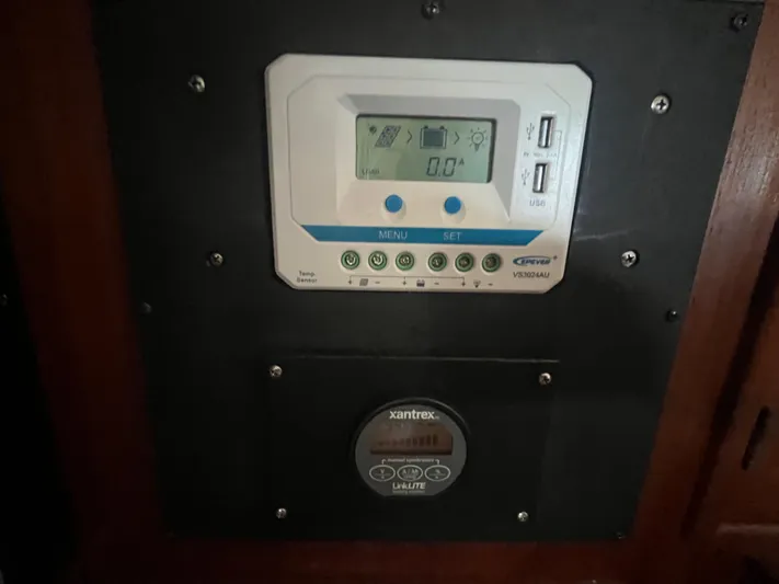  Yacht Photos Pics Control panel on a 1997 Island Packet 350 sailboat, featuring digital displays and USB ports.