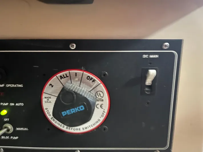  Yacht Photos Pics Battery switch panel on a 1997 Island Packet 350 sailboat, featuring Perko controls.