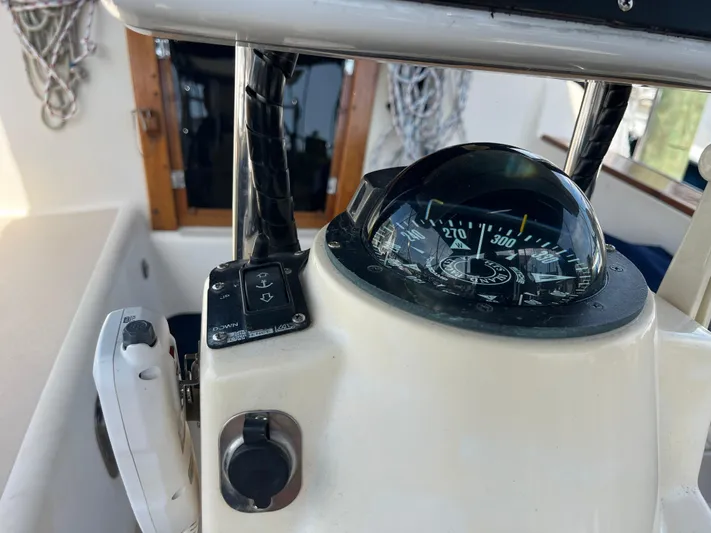  Yacht Photos Pics Compass and controls on a 1997 Island Packet 350 sailboat.