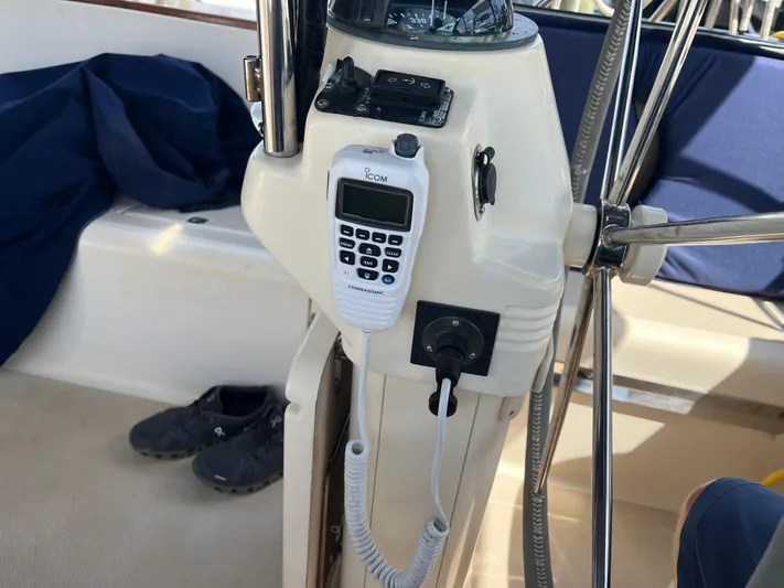  Yacht Photos Pics 1997 Island Packet 350 sailboat cockpit with navigation equipment and radio.