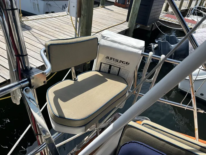  Yacht Photos Pics Cushioned seat on 1997 Island Packet 350 sailboat with Lifesling safety equipment.