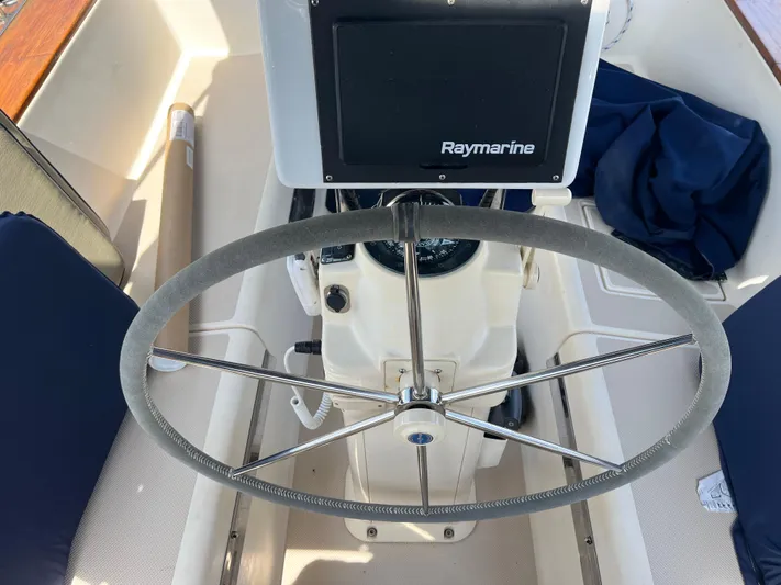  Yacht Photos Pics 1997 Island Packet 350 sailboat helm with Raymarine navigation system.