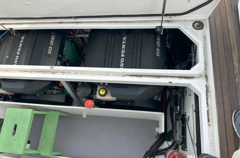 Tea Moana Yacht Photos Pics Engine compartment of 2016 Jeanneau NC 11 with Volvo Penta engines visible.