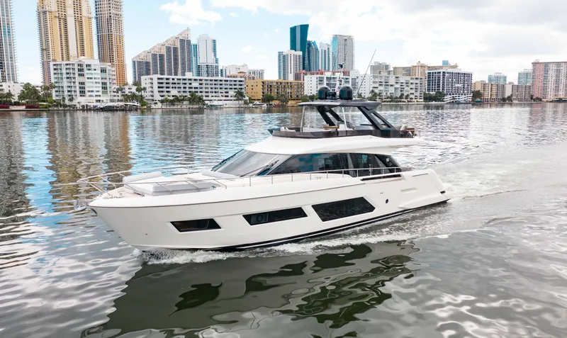 Our Trade Yacht Photos Pics Luxury Ferretti Yachts 670 cruising in urban waterfront, 2022 model.