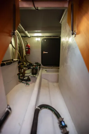  Yacht Photos Pics Engine room of 2018 Hylas M44 yacht with fire extinguisher and piping.