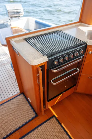  Yacht Photos Pics 2018 Hylas M44 yacht kitchen with stove and ocean view.
