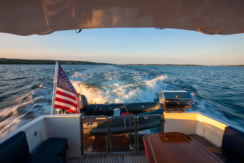  Yacht Photos Pics 2018 Hylas M44 yacht cruising with American flag and ocean view.