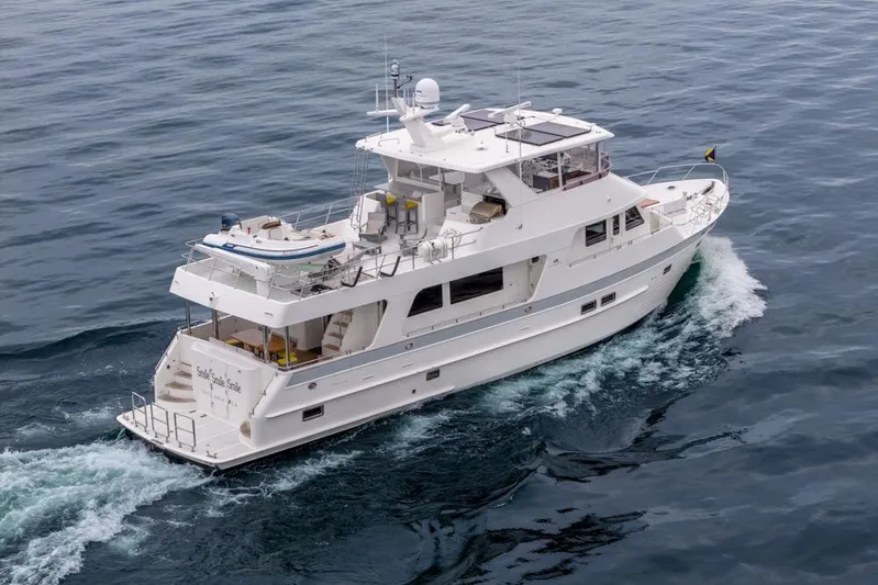 Smile Smile Smile Yacht Photos Pics 2022 Outer Reef 720 Motor Yacht cruising on open water.