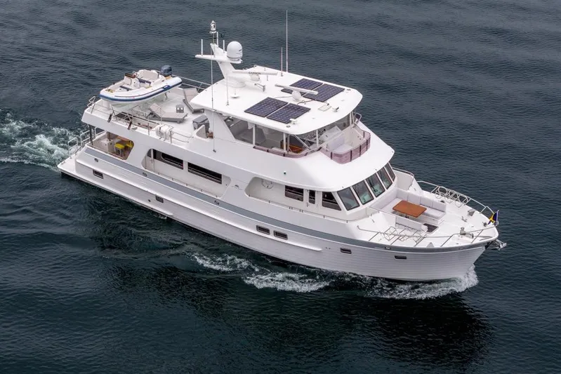 Smile Smile Smile Yacht Photos Pics 2022 Outer Reef 720 Motor Yacht cruising on open water.