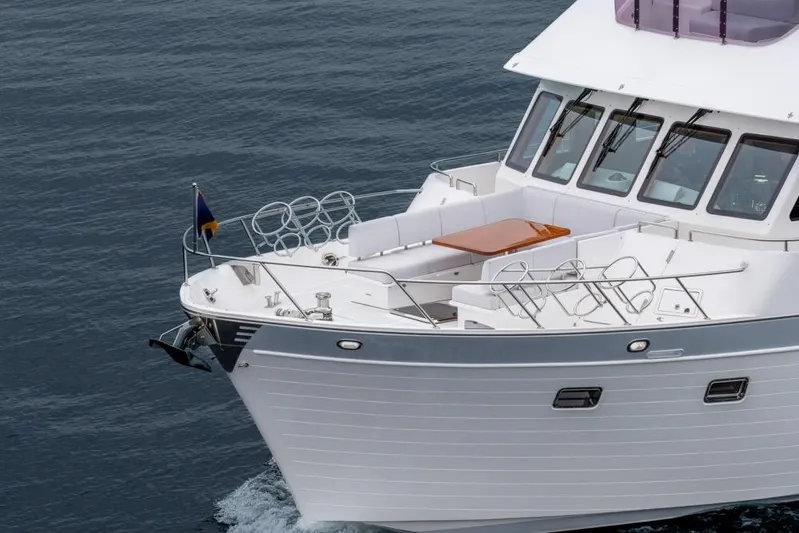 Smile Smile Smile Yacht Photos Pics 2022 Outer Reef 720 Motor Yacht cruising on calm waters.