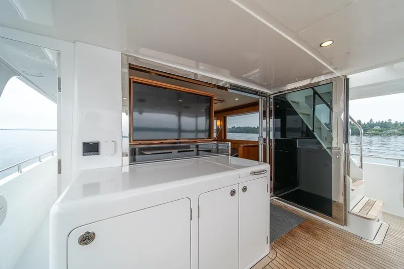 Smile Smile Smile Yacht Photos Pics 2022 Outer Reef 720 Motor Yacht interior with sleek design and modern amenities.