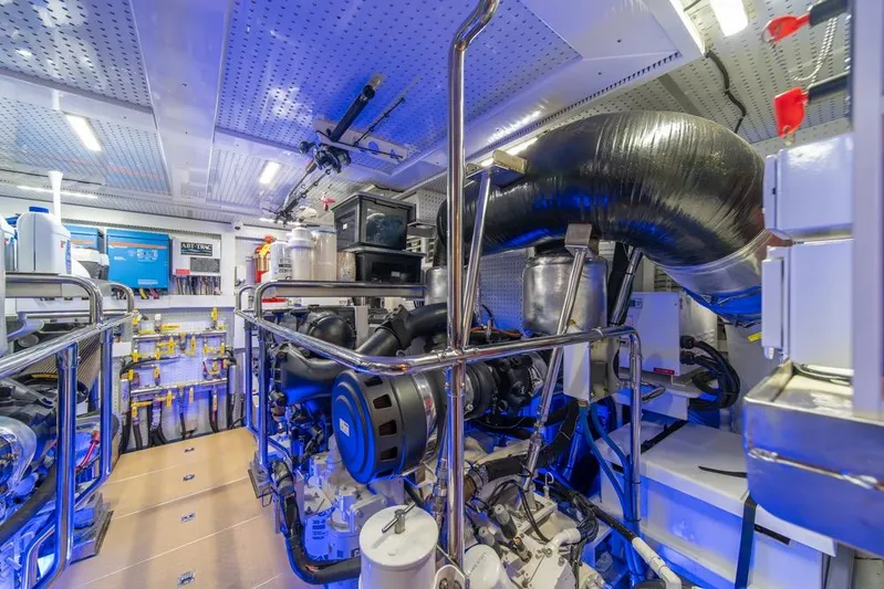 Smile Smile Smile Yacht Photos Pics Engine room of 2022 Outer Reef 720 Motor Yacht, featuring advanced machinery and equipment.