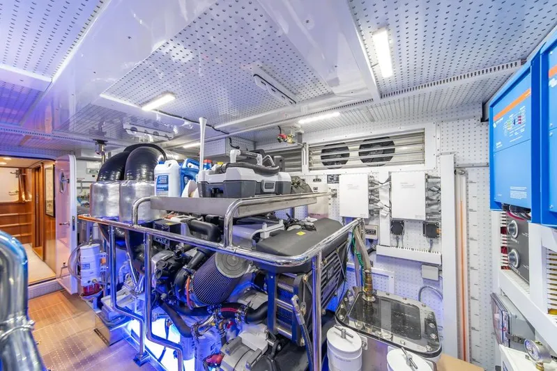 Smile Smile Smile Yacht Photos Pics Engine room of 2022 Outer Reef 720 Motor Yacht, featuring advanced equipment and systems.