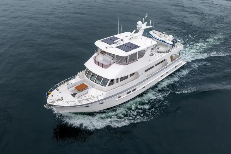 Smile Smile Smile Yacht Photos Pics 2022 Outer Reef 720 Motor Yacht cruising on open water.