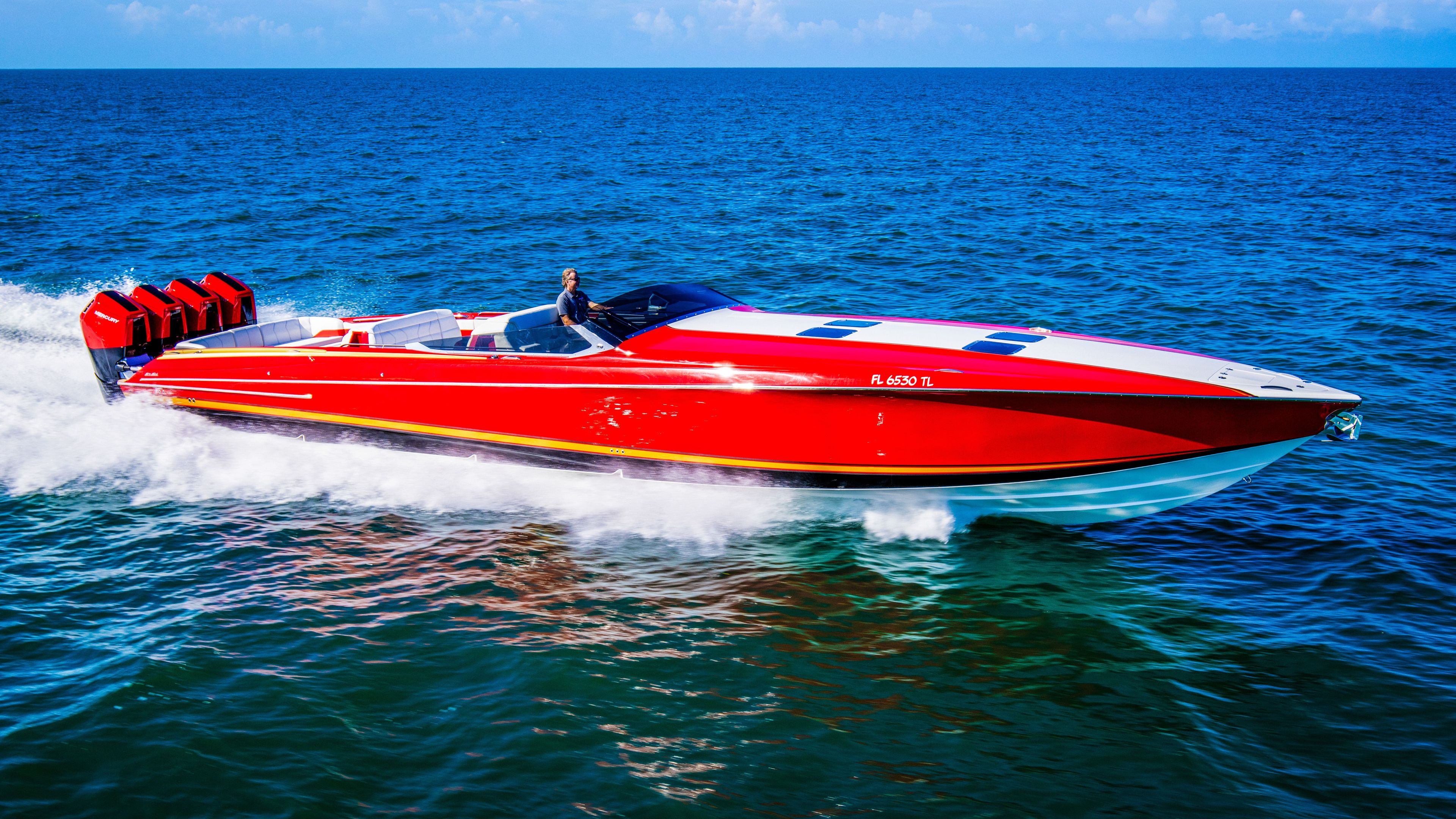 2026 Nor-Tech 550 & 560 Sport Center Console boat speeding on open water.