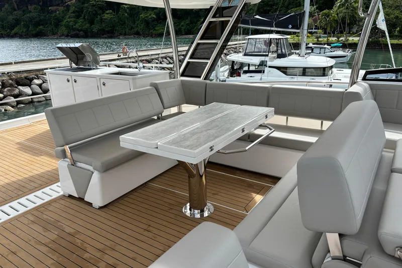  Yacht Photos Pics Luxurious seating area on 2025 Aquila 54 Yacht with sleek design and modern amenities.