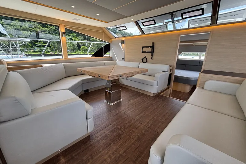  Yacht Photos Pics Luxurious interior of 2025 Aquila 54 Yacht with elegant seating and modern design.