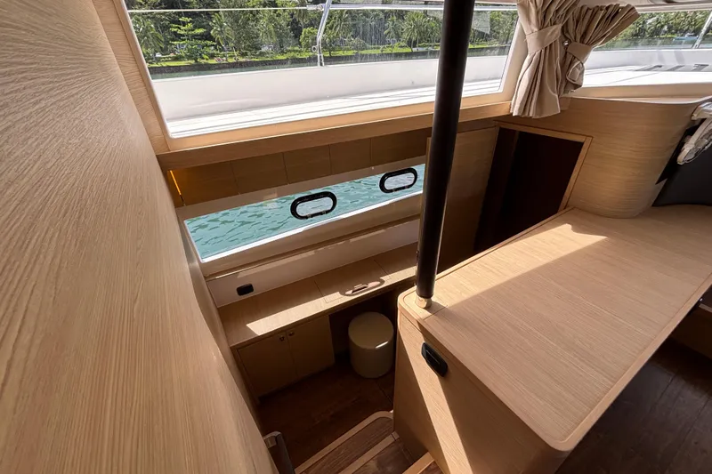  Yacht Photos Pics Interior of 2025 Aquila 54 Yacht, featuring elegant wood finishes and natural light.