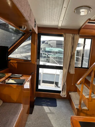 Broker Of Venice Yacht Photos Pics 1988 Sea Ranger aft cabin interior with wooden finishes and staircase.