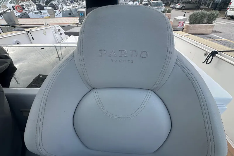  Yacht Photos Pics Pardo Yachts 43, 2021 model, luxury boat seat with logo at marina.
