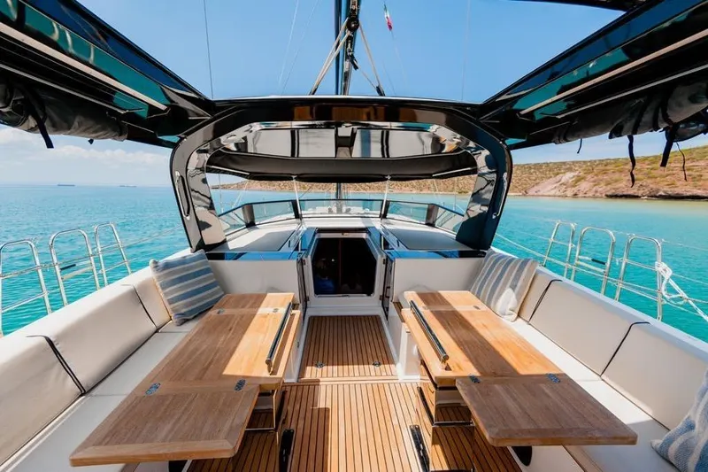 Dictador Yacht Photos Pics Luxurious 2022 Beneteau Oceanis Yacht 62 with elegant deck and seating area.