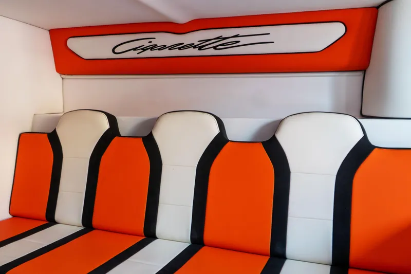  Yacht Photos Pics Orange and white seating in 2022 Cigarette 515 boat interior.