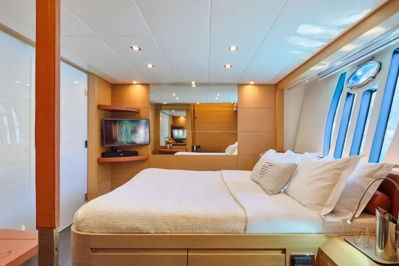 For Ever Yacht Photos Pics Luxurious bedroom interior of 2008 Pershing 80 yacht with modern design and elegant furnishings.