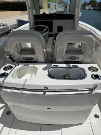  Yacht Photos Pics 2020 Boston Whaler 280 Outrage boat interior with dual seats and console.