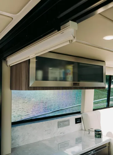  Yacht Photos Pics Interior of 2021 Regal 38 Grande Coupe yacht with modern kitchen cabinetry.