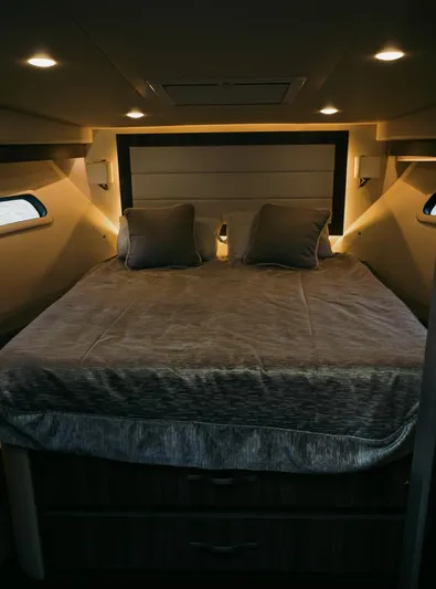  Yacht Photos Pics Luxurious bedroom interior of 2021 Regal 38 Grande Coupe yacht.