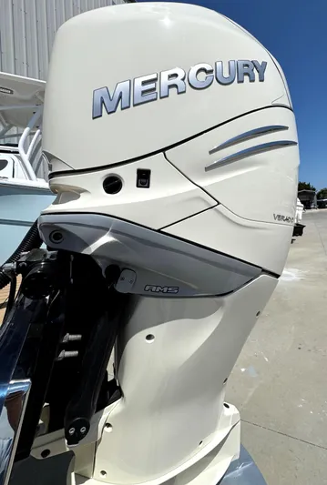  Yacht Photos Pics 2023 Chris-Craft Launch 28 GT with Mercury outboard engine, side view.