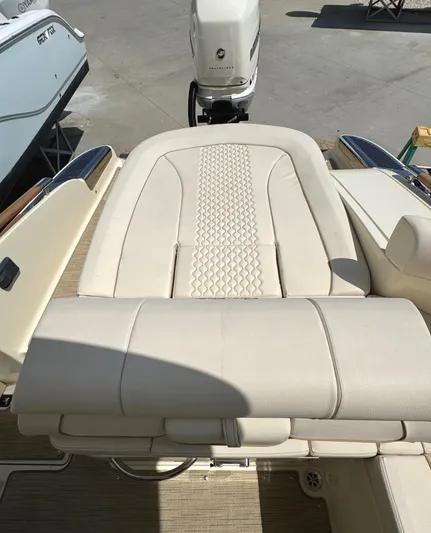  Yacht Photos Pics 2023 Chris-Craft Launch 28 GT boat with luxurious beige seating and sleek design.