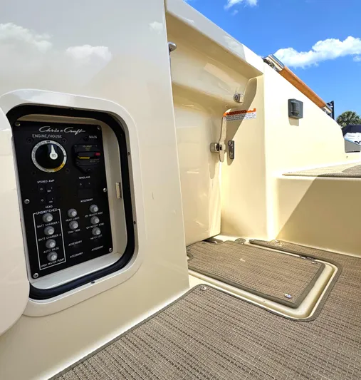  Yacht Photos Pics 2023 Chris-Craft Launch 28 GT boat interior with control panel and deck details.