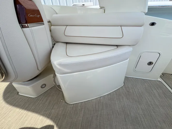 Yacht Photos Pics 2023 Chris-Craft Launch 28 GT interior seating with elegant upholstery and sleek design.