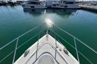 Bow view of 2007 Cruisers Yachts 447 Sport Sedan in marina.