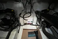 Engine room of 2007 Cruisers Yachts 447 Sport Sedan with visible machinery and wiring.