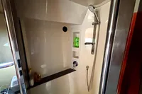Shower area in 2007 Cruisers Yachts 447 Sport Sedan, featuring modern fixtures and storage.
