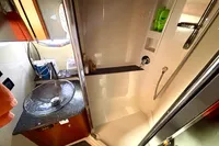 Bathroom interior of 2007 Cruisers Yachts 447 Sport Sedan with modern fixtures.