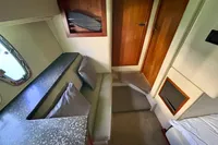 Interior of 2007 Cruisers Yachts 447 Sport Sedan, featuring seating and wooden accents.