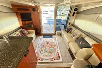 Luxurious interior of 2007 Cruisers Yachts 447 Sport Sedan with elegant seating and vibrant decor.
