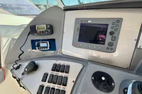 2007 Cruisers Yachts 447 Sport Sedan helm with navigation controls and communication devices.