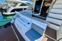 2007 Cruisers Yachts 447 Sport Sedan, docked, featuring spacious deck and luxurious interior.