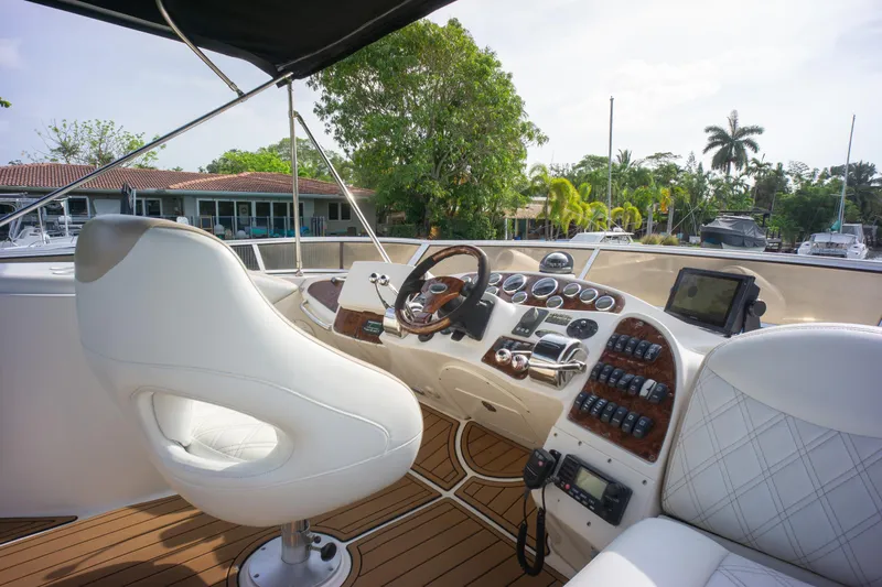  Yacht Photos Pics Luxurious 2007 Meridian 459 Motoryacht helm with modern controls and plush seating.